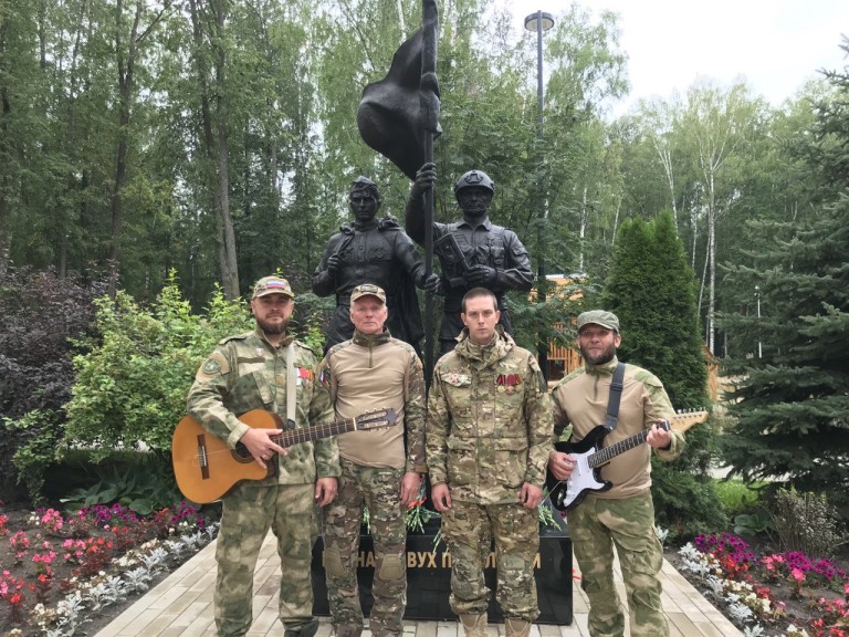 Град